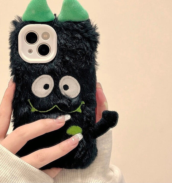 Fluffy black winter season phone case with a monster on for iPhone
